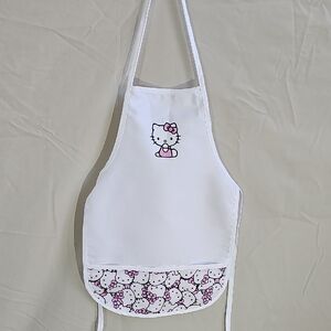 Hobby Lobby White and Pink Hello Kitty Bib with Printed Front Pocket